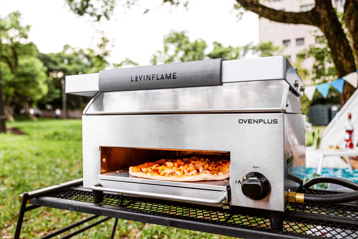The OvenPlus is claimed to be an all-in-one portable kitchen, consisting of a stainless steel box with a few crucial moving parts