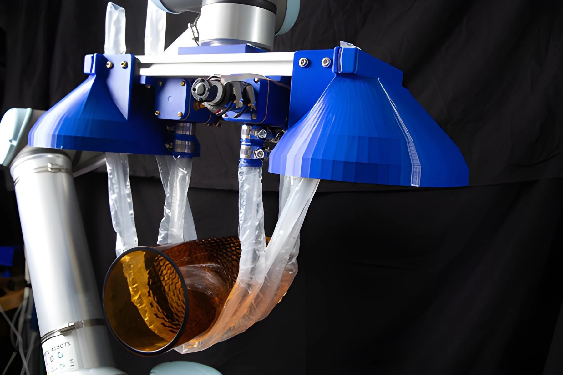 Thanks to its soft morphing arms, the robot can also handle gentle tasks like lifting and moving a fragile glass vase