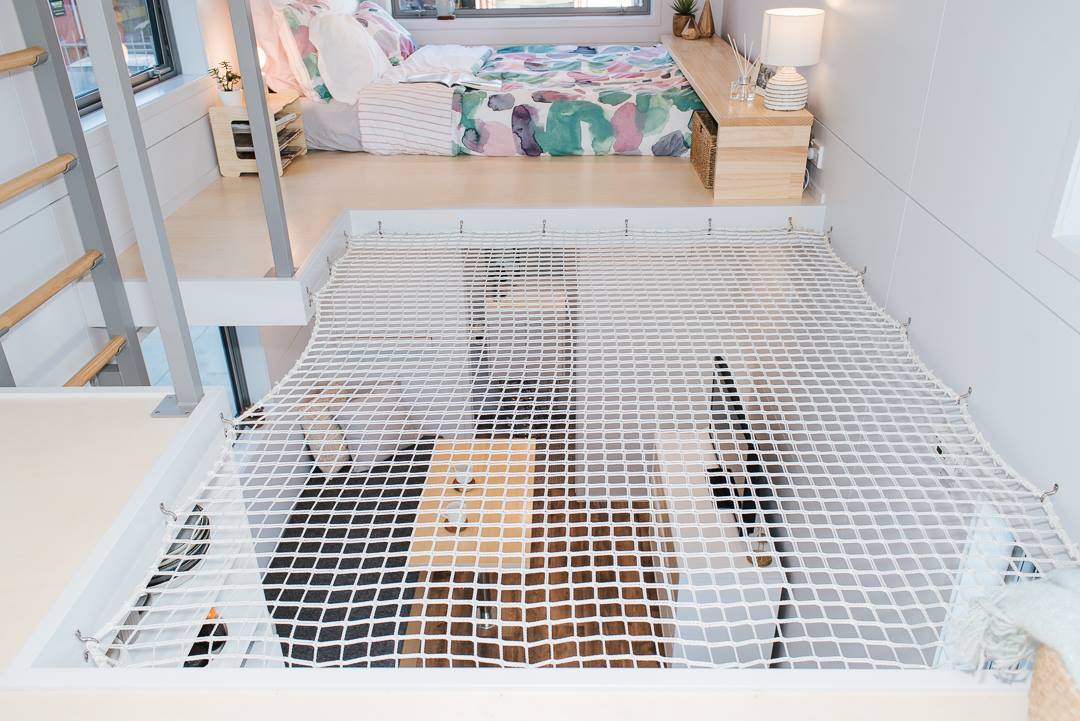 A net offers safety and some additional space in the Larissa and Tyler Tiny House