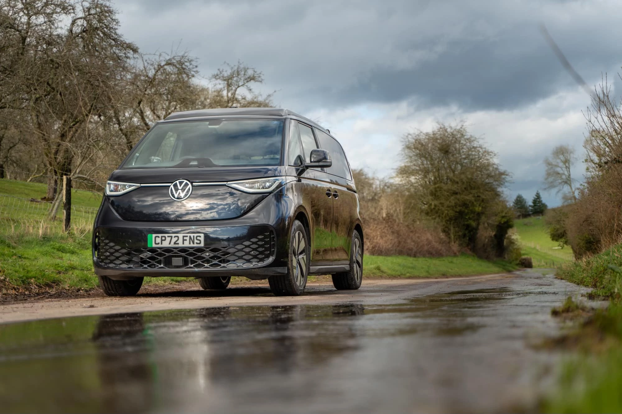 With its black paint job, electric powertrain and neatly fit pop-up roof, the TC Dvan Buzz looks the part of a properly low=-