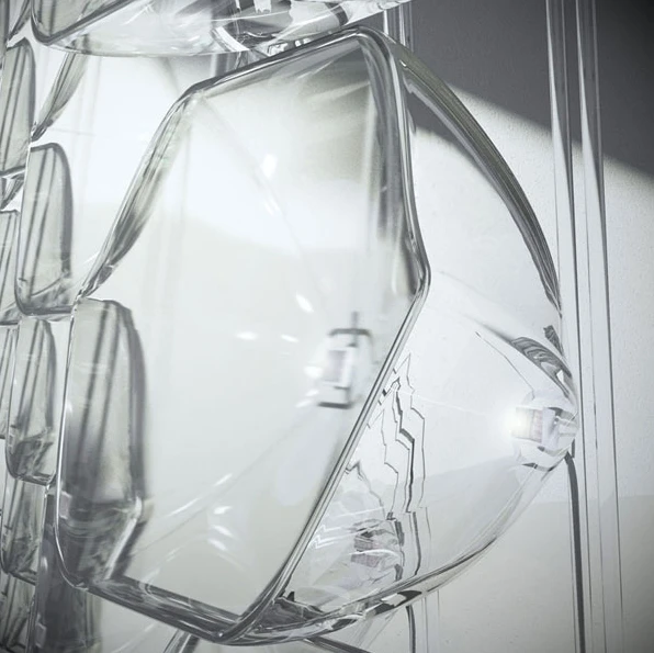 The concentrator cell uses a lens to focus incoming light onto the solar cell