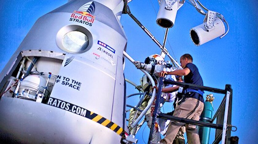Felix Baumgartner climbing into the Red Bull Stratus capsule