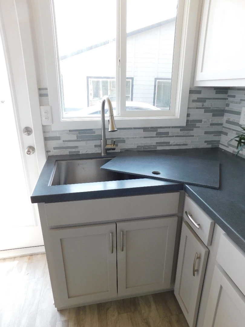 The Ozark's kitchen sink can be turned into extra counter space with a removable section