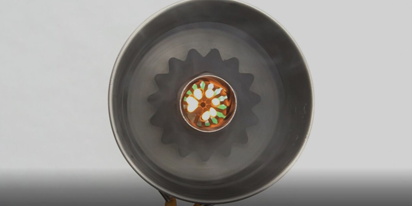 Looking down on the PeakBoil stove, immersed in a kettle full of water
