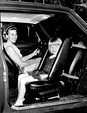 The first child seat Volvo sold was this reversible passenger seat with child brace on its Amazon model (1967)