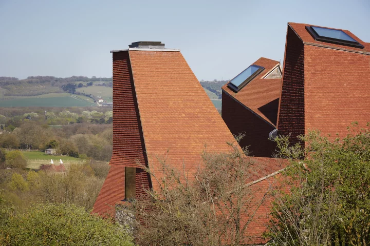 Caring Wood is a large luxury home situated within a rolling 84 acre (33 hectare) estate in the Kent countryside