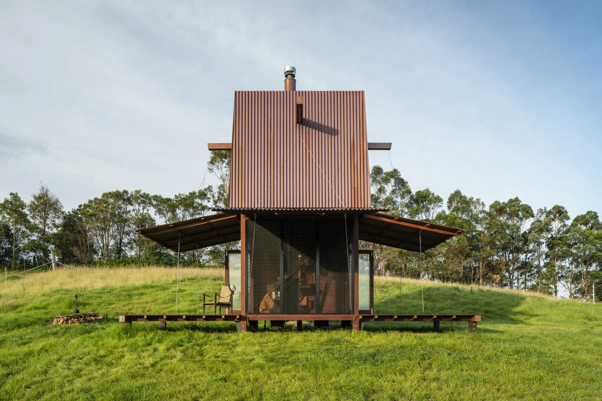 Permanent Camping 2, by Casey Brown Architecture, consists of a two-story tower structure that opens up to the outside with operable facades