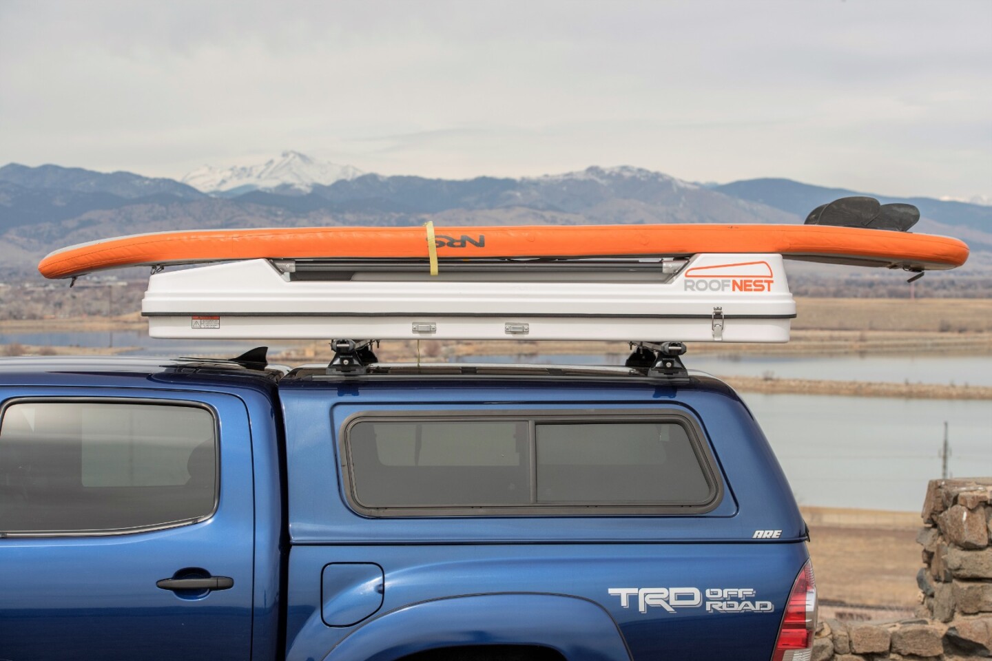 Roofnest Sandpiper rooftop tent carries bikes and shelter atop your
