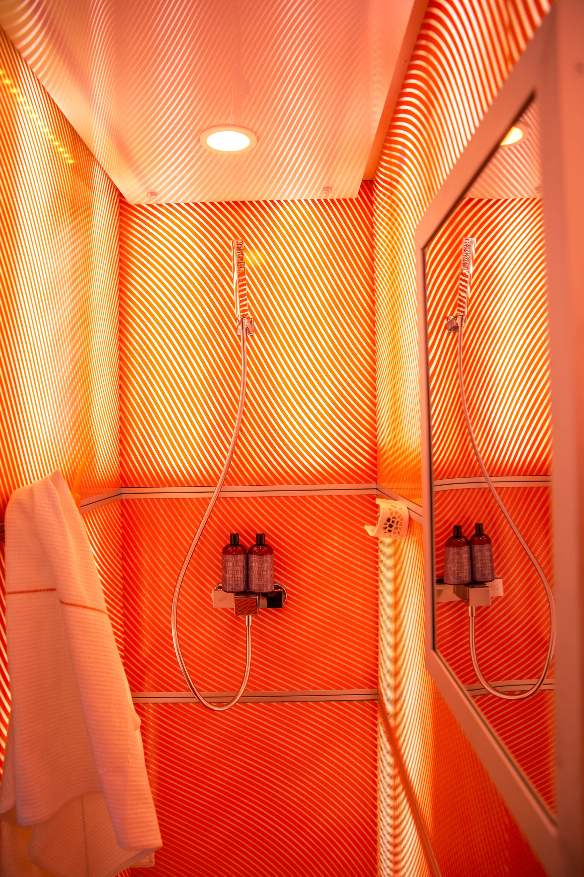 The bathroom in SCADpad Europe features op art vinyl graphics on the walls (Photo: SCADpad)