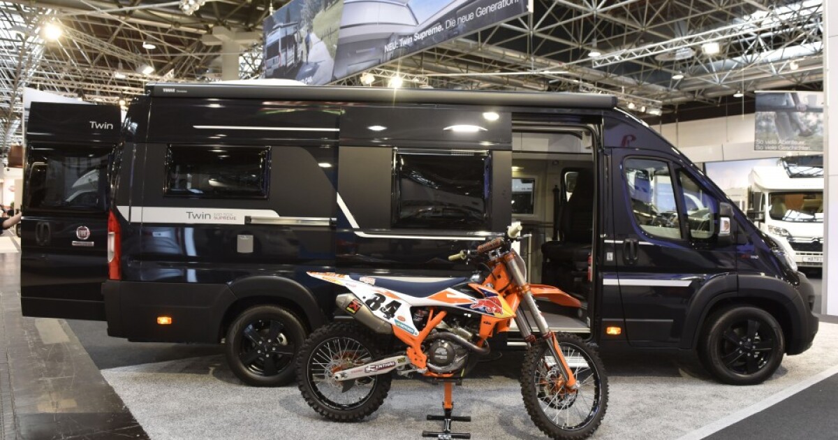 Camper van answers adventure's call with flex bed-garage and panoramic roof