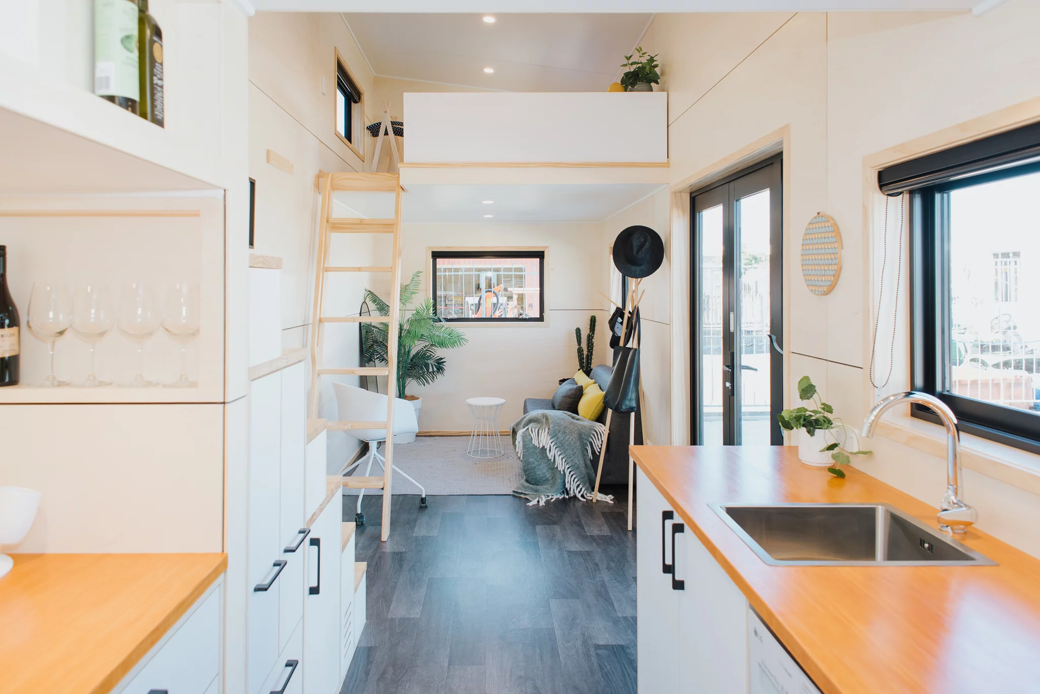 The Dreamweaver Tiny House's interior is finished in poplar plywood