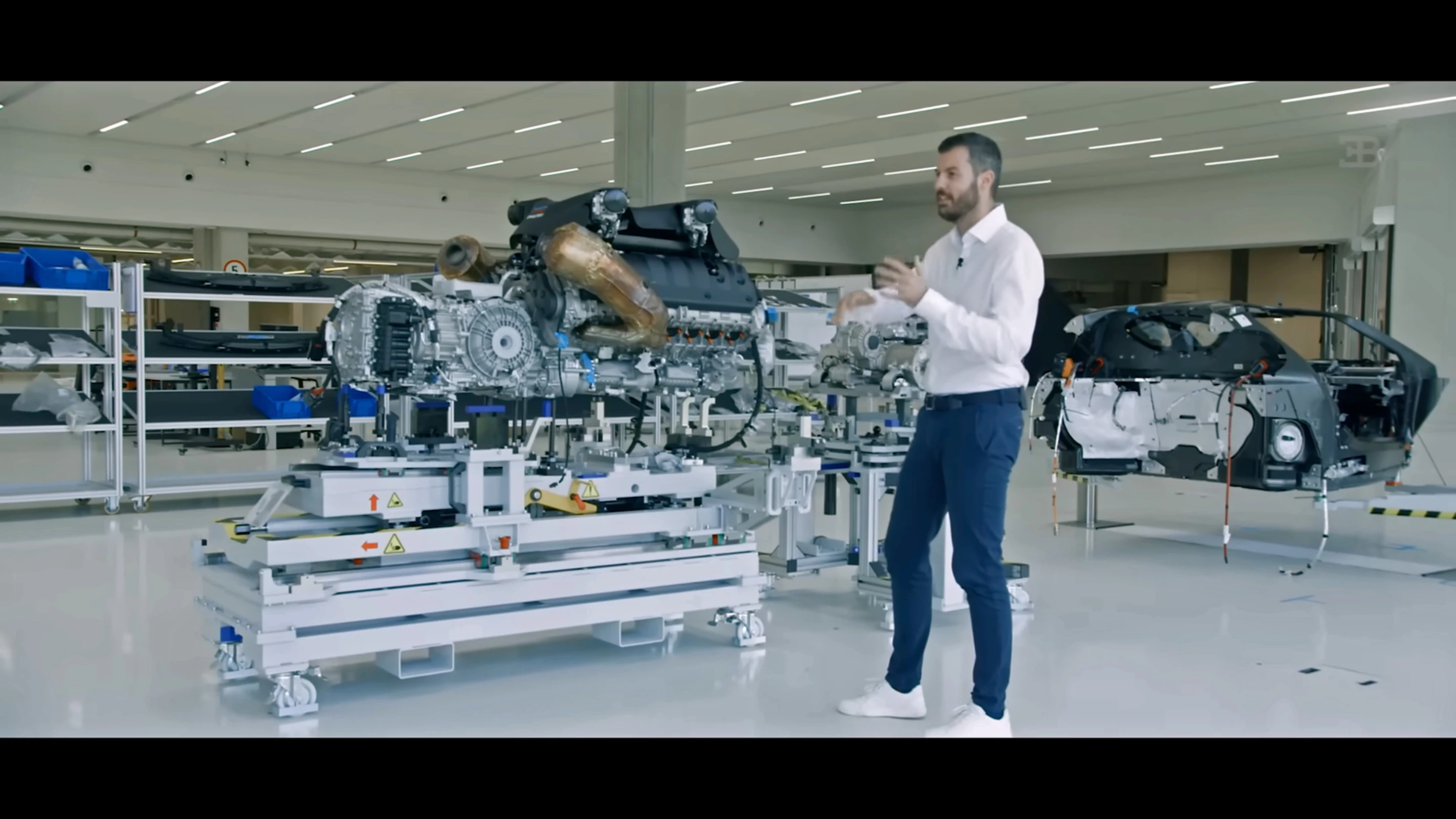 The entire engine, transmission, and electric motor. It's significantly lighter than the W16 with transmission