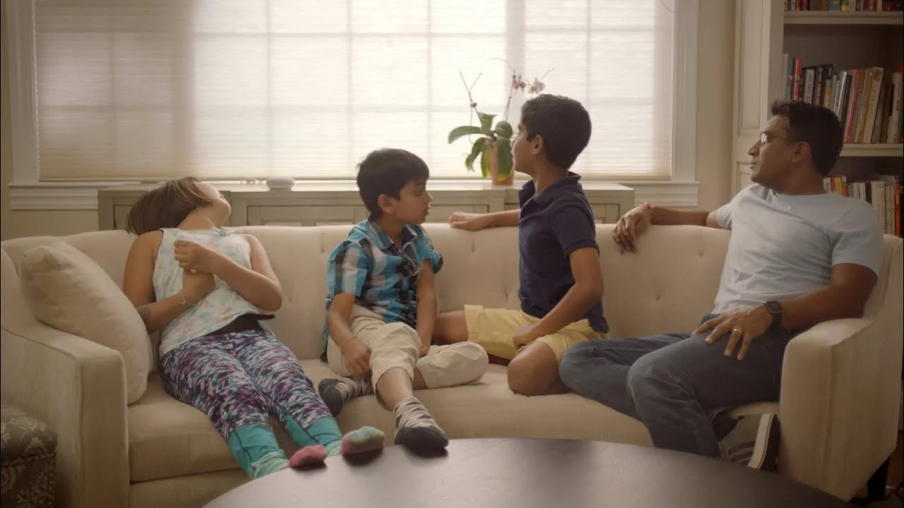 The Google Assistant interacting with a family