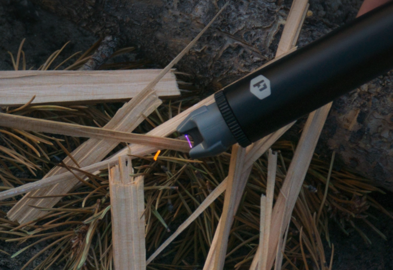 The Power Practical Sparkr lights a fire with its plasma lighter