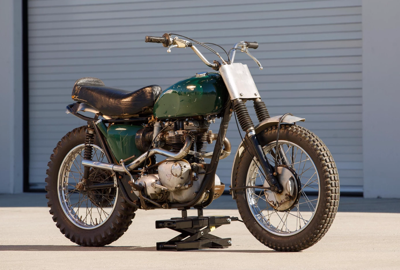 Finally, there's a second McQueen bike at the Bonhams auction - a 1963 Triumph Bonneville Desert Sled ridden extensively by Steve McQueen, modified by his friend and trail riding buddy Bud Ekins and painted by Kenny Howard (better known as Von Dutch). That's quite some pedigree and although the price estimate from the auctioneers is only $50,000 to $60,000, when Steve McQueen is involved anything might happen. A Kawasaki 125 two-stroke owned by McQueen and painted by Von Dutch sold for $55,000.