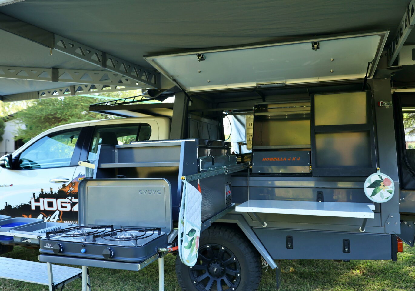 The passenger-side front canopy is dedicated to outdoor cooking