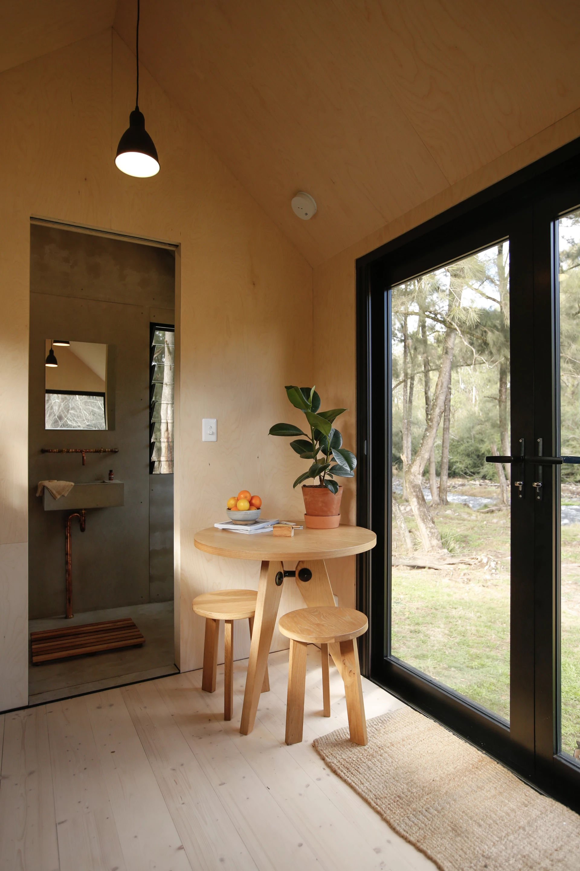 The Barrington Tops Cabin's interior is finished in birch plywood