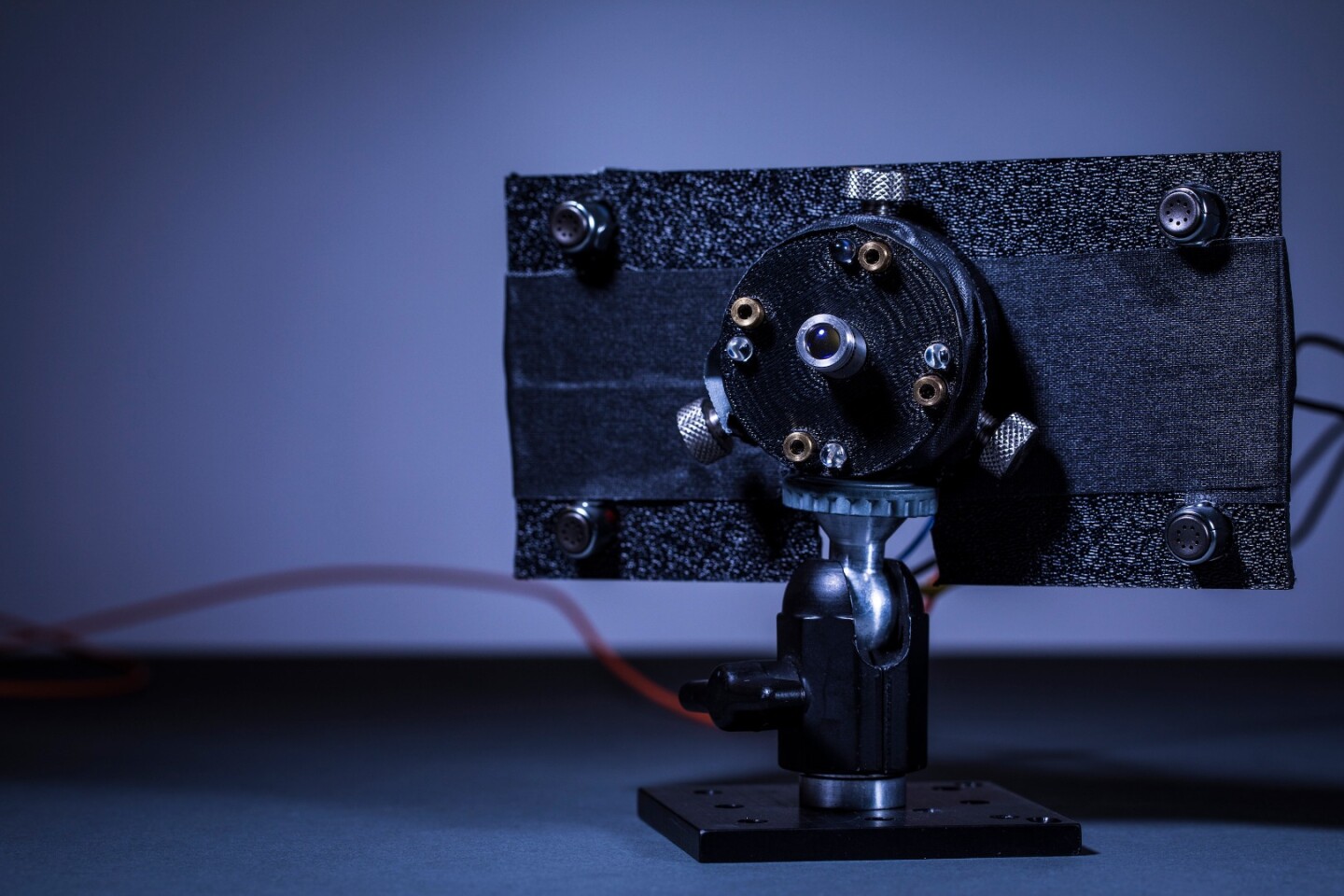 The laser emitter is made up of a charge beam in the center, surrounded by four guard beams and photodiode sensors that detect when someone approaches and shuts off the charge beam