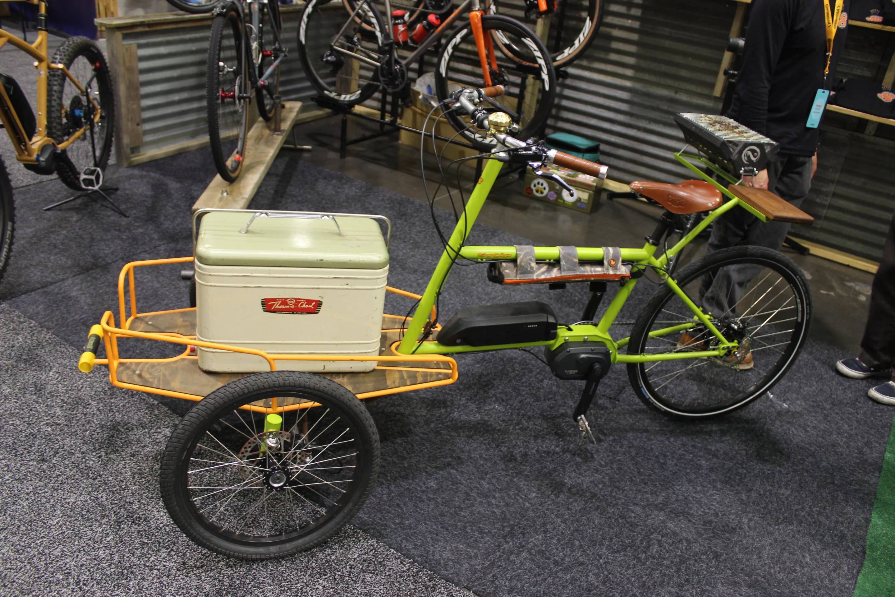 SyCip Designs was displaying this electric-assist cargo trike, which is ready for a cookout – note the built-in grill and cutting board at the back