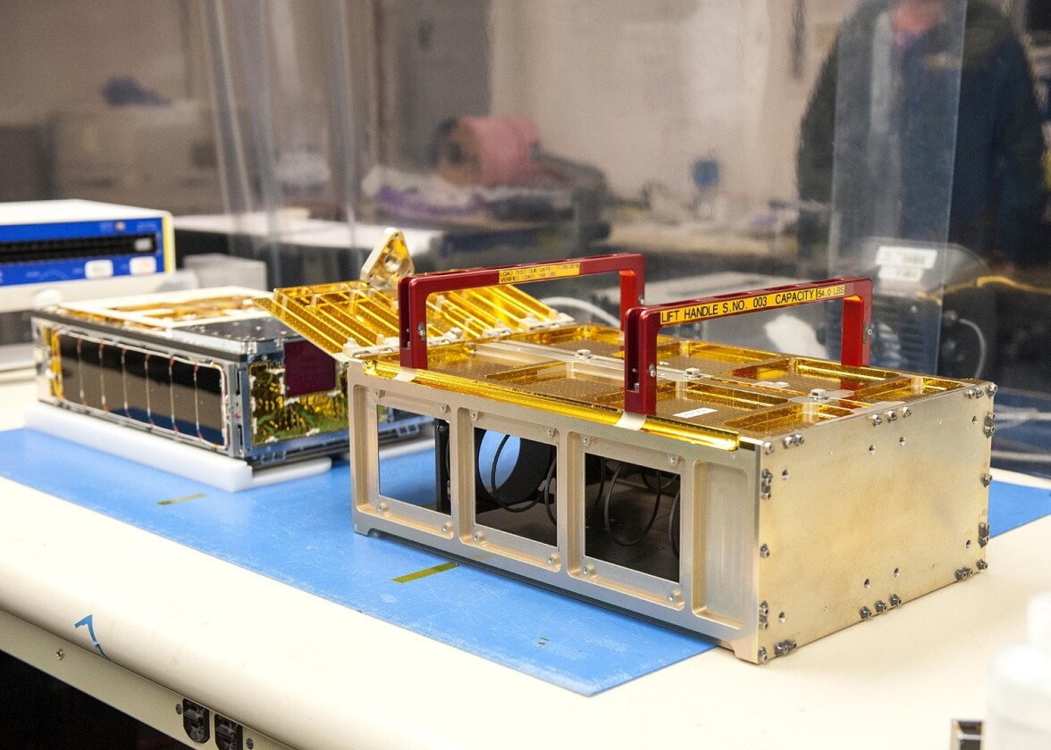 One of the MarCO CubeSats inside a cleanroom at Cal Poly San Luis Obispo, before being placed into its deployment box