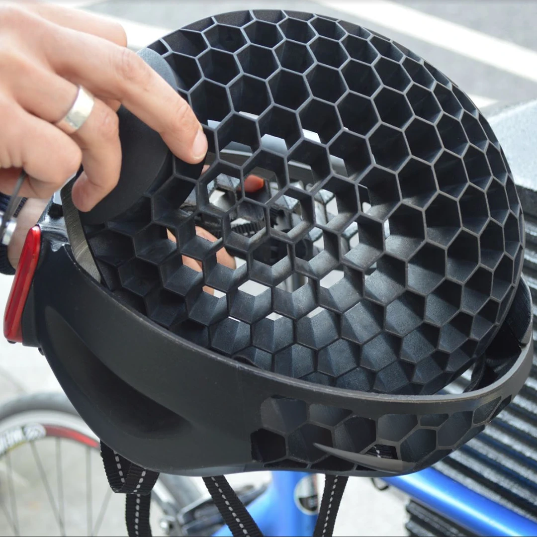 The top "dome" part of the Cyclo swivels around laterally (it pivots at the front and back), so it nests upside-down within its bottom section