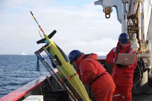 Oceanographers run through a series of tests in preparation to deploy one of the ocean gliders (Photo: Caltech)