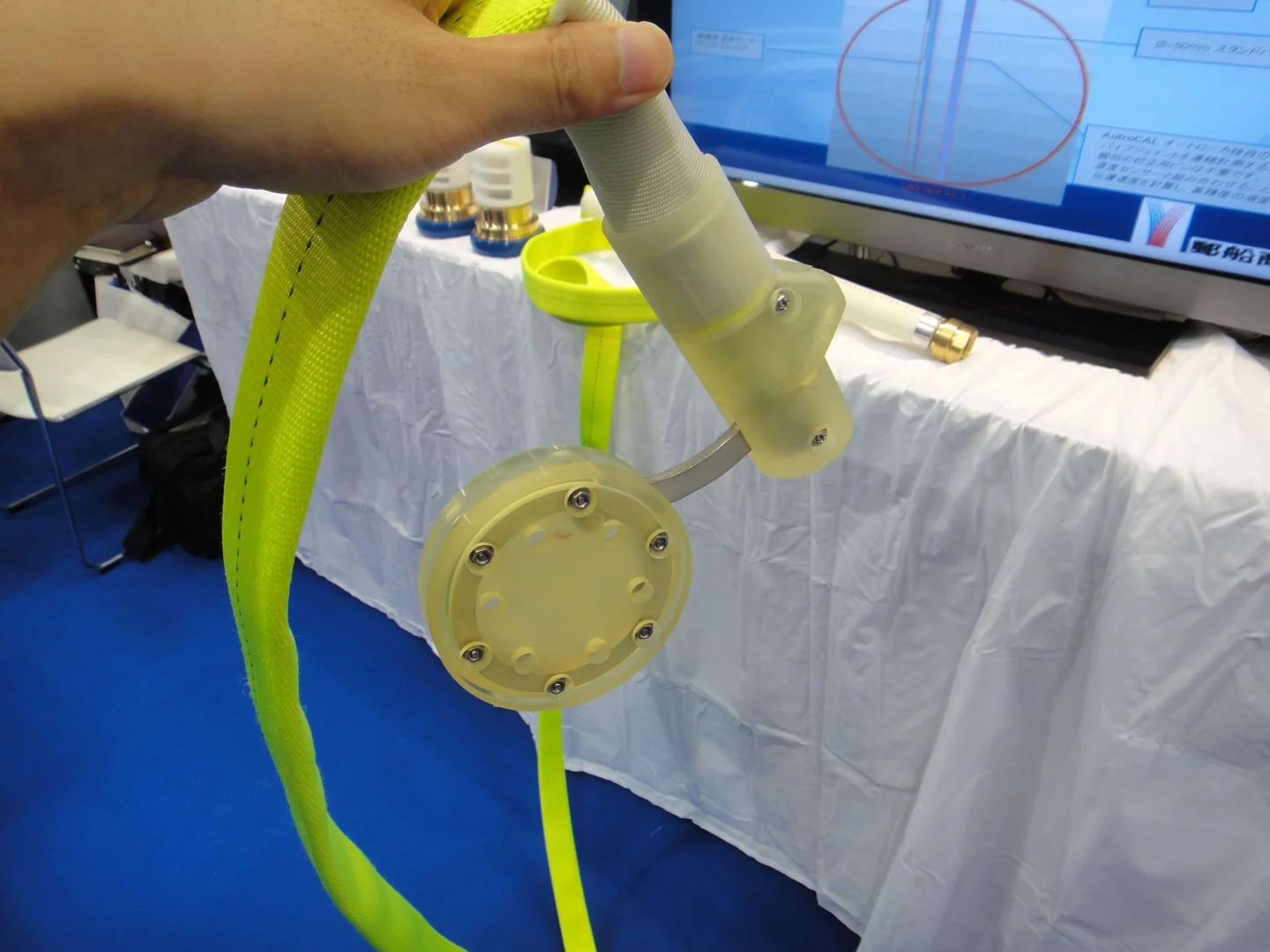 The nozzles and sinkers have a rubber coating, to keep them from damaging the paint on the ship's hull