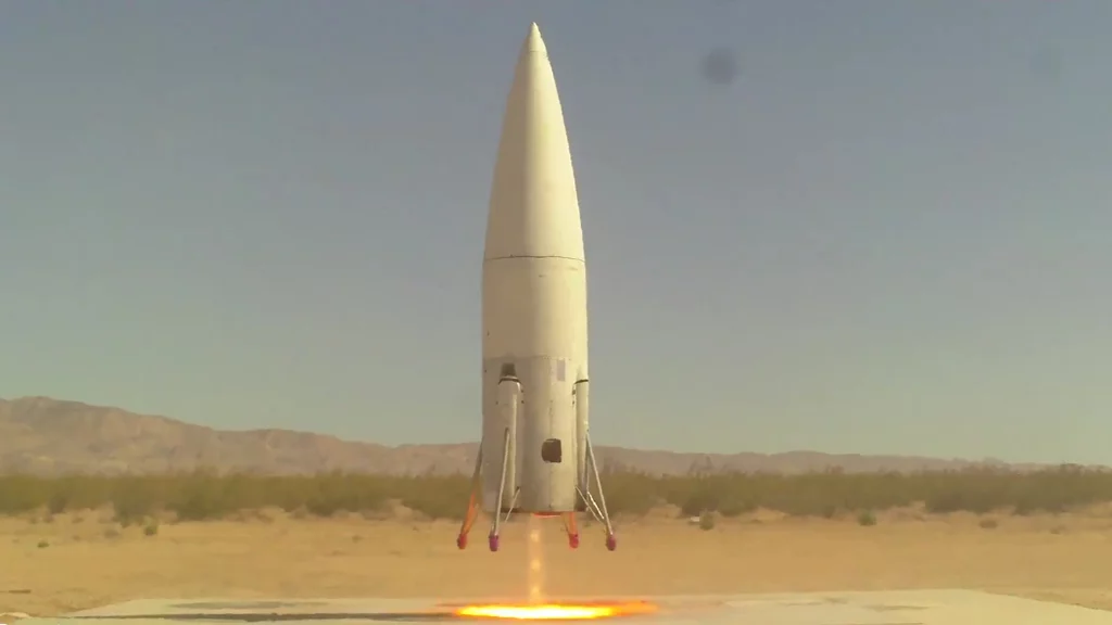 The Masten Xaero landing vertically on it's launch platform in the Mohave desert