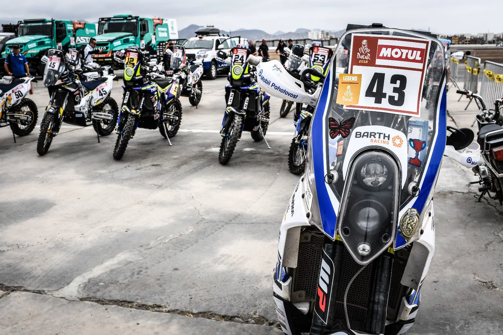 Before the storm: motorcycles lined up for scrutineering in Lima, Peru