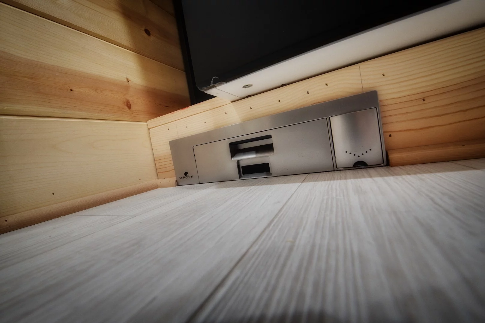 The Acorn features a built-in vacuum cleaner