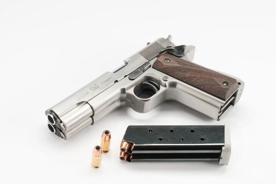 The pistol holds 16 .45 ACP rounds split between two columns, which connect to a single base plate and can be loaded like a single magazine