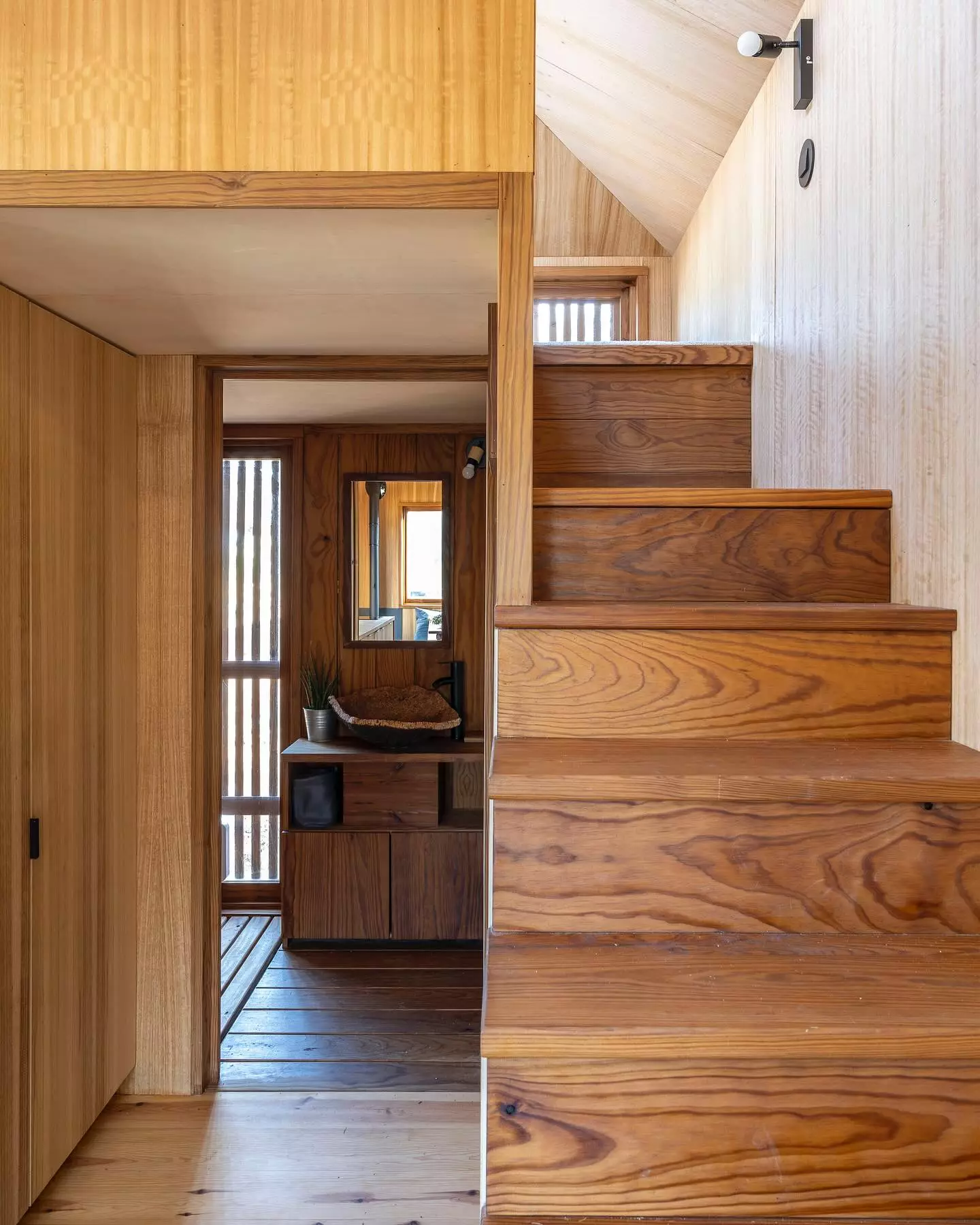 The Raposa's bathroom is located on the opposite side of the home to the living room and includes a secondary entrance