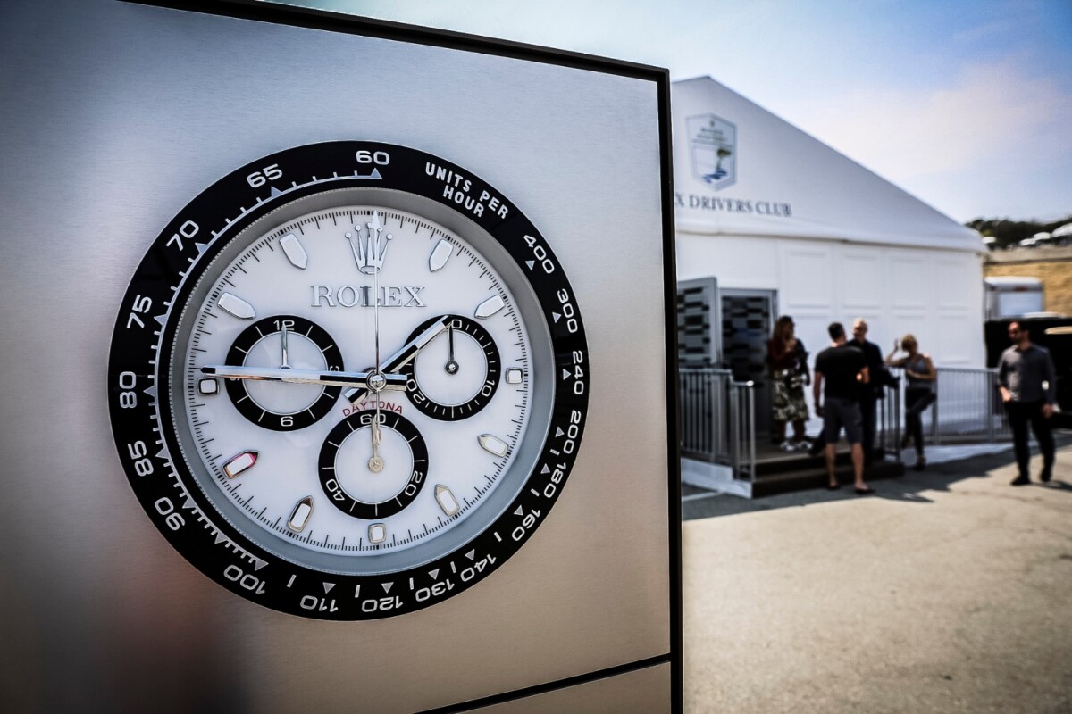 Oversized Rolex timepiece outside the sponsor's tent