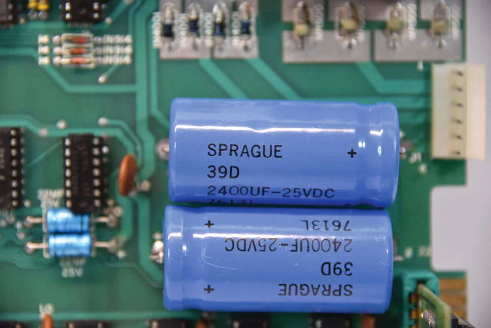 The distinct blue capacitors on the Apple I board