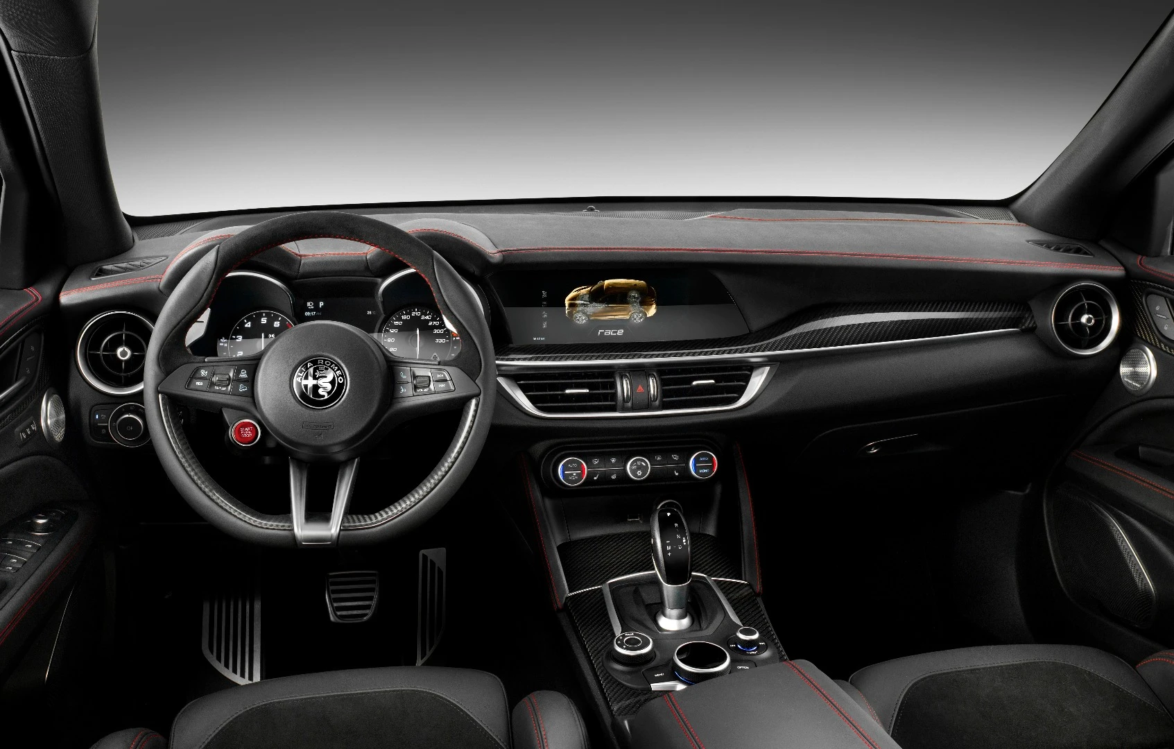 The Stelvio is the same as the Giulia from behind the wheel