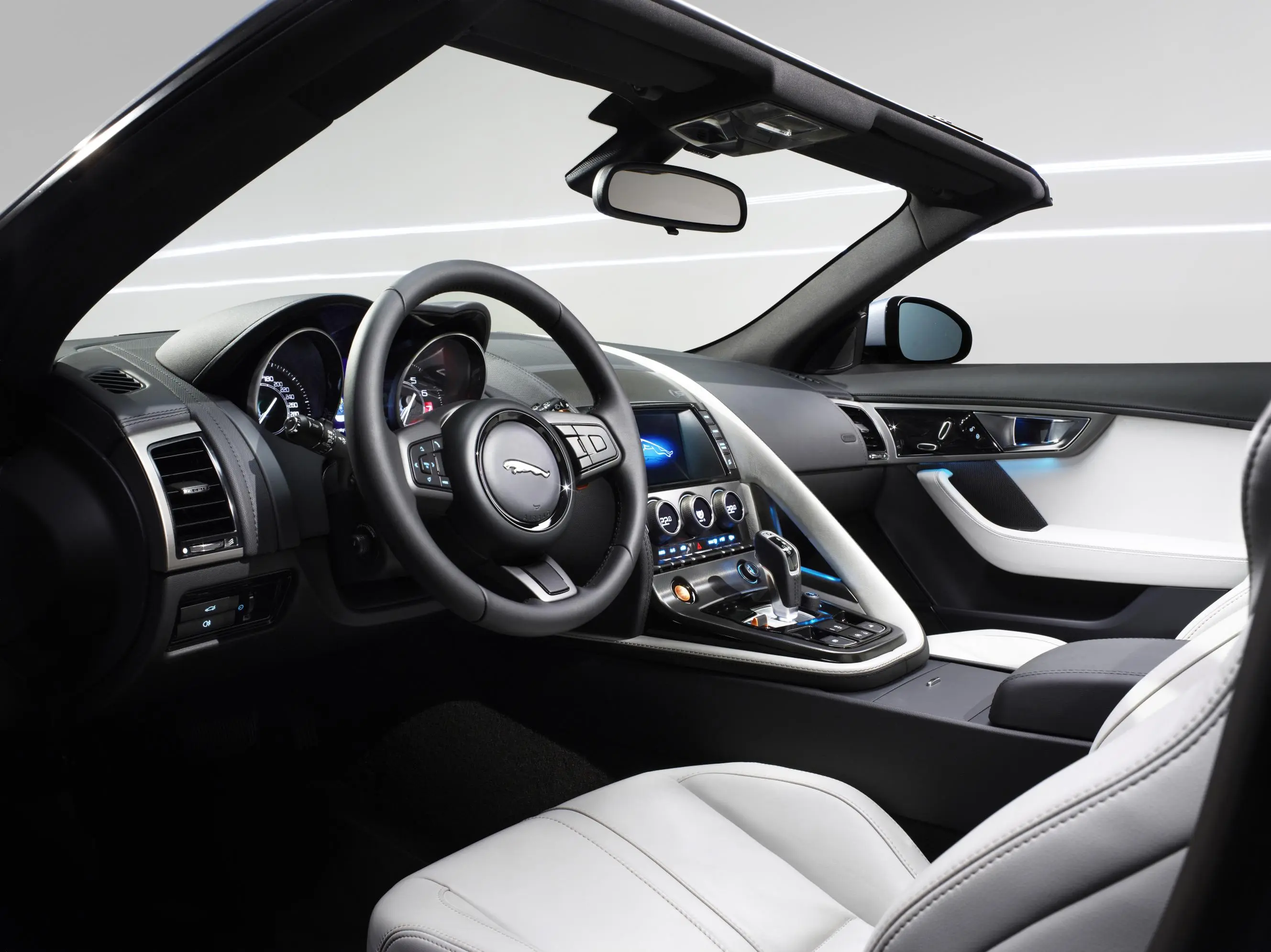 Jaguar gives the driver more feedback by pulling controls for functions like ventilation control out of the touchscreen