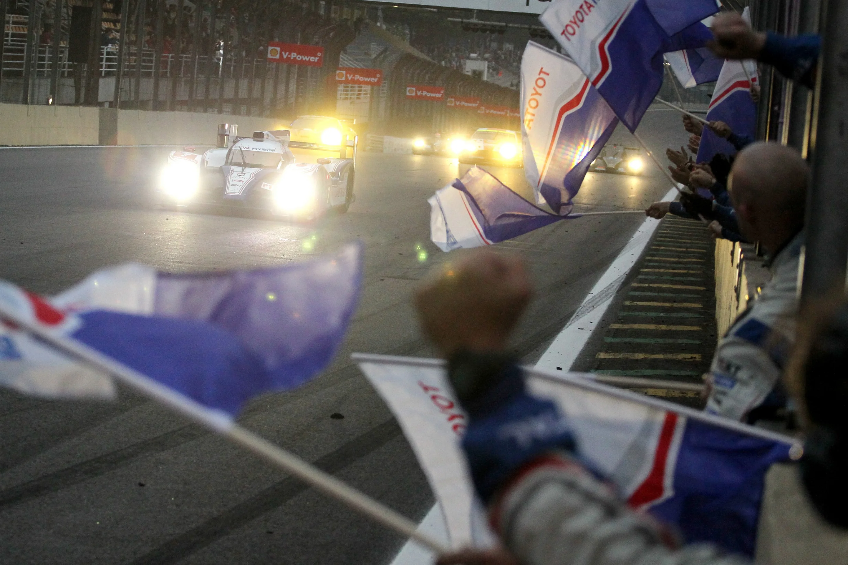 The Toyota team takes the flag in an historic first for the marque