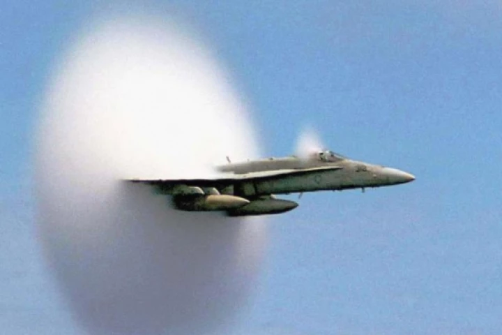 An F/A-18E/F Super Hornet breaks the sound barrier