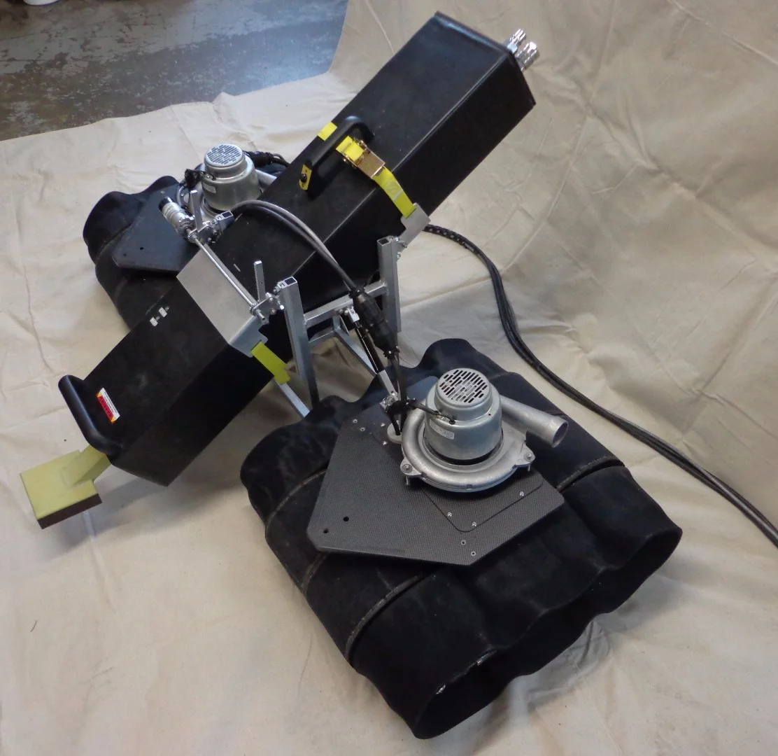 The ICM system strips rubber cladding off submarines by remote control