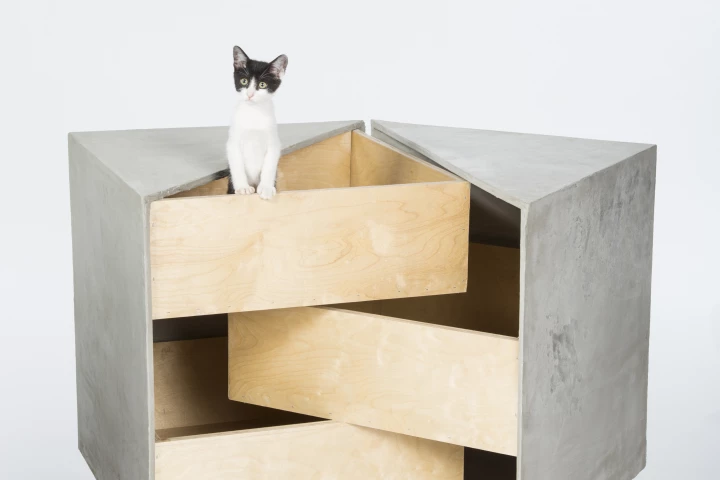 Sneaky Drawers, by rdc, is a shelter based on three intersecting drawers that provides a sanctuary for multiple cats
