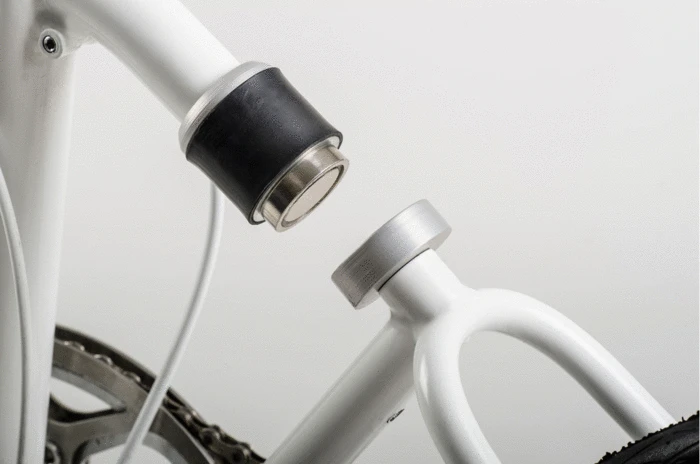 ... a combination coupler and rear shock absorber ...