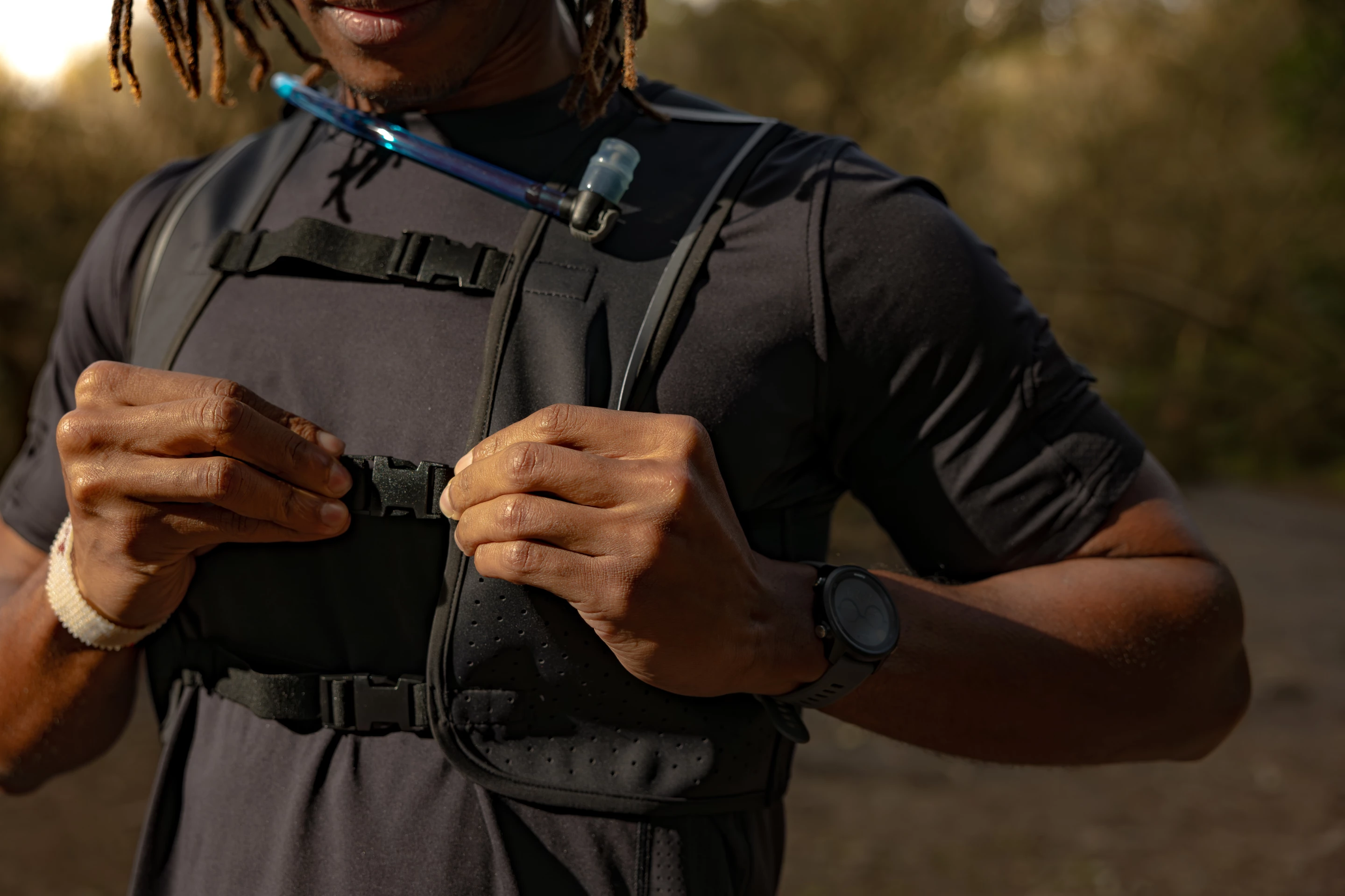 The pouch's shoulder straps get tightened down before every run