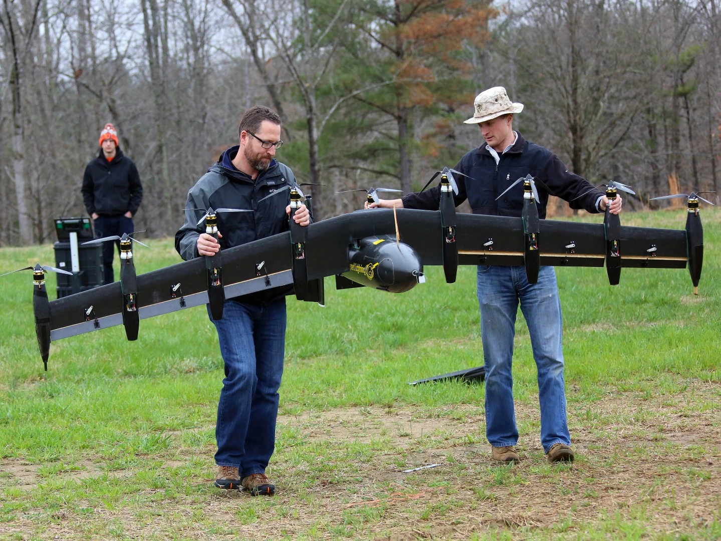 Engineers David North (L) and Bill Fredericks (R) carry the Greased Lightning before one of its flight tests (Photo: NASA Langley/David C. Bowman)