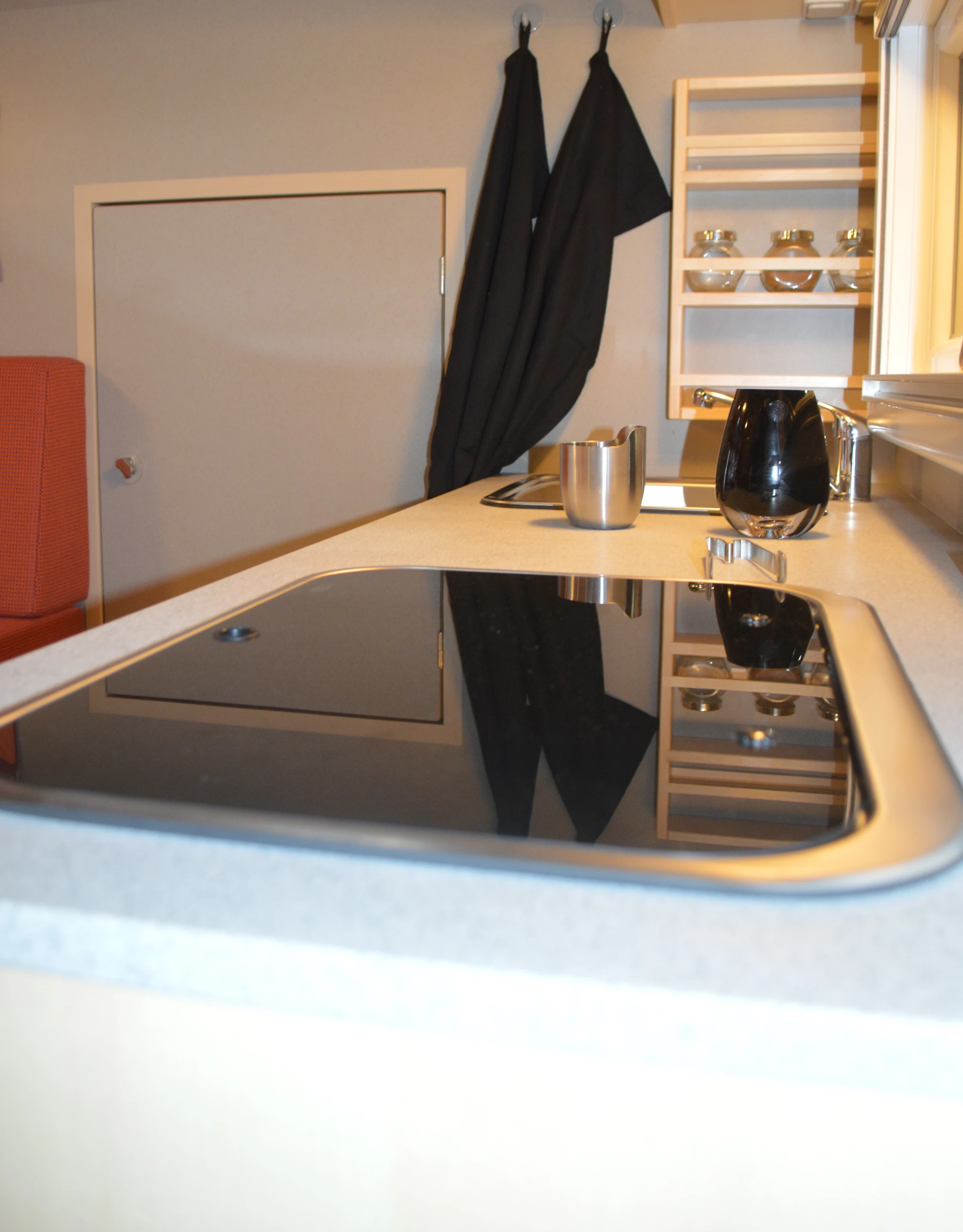 The EX 480's 2-burner stove is covered by a glass plate