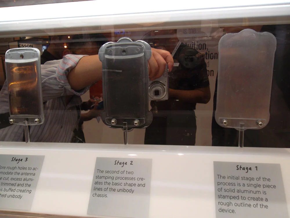Stages of processing the aluminum to create the HTC One S (Photo: Enid Burns / Gizmag)