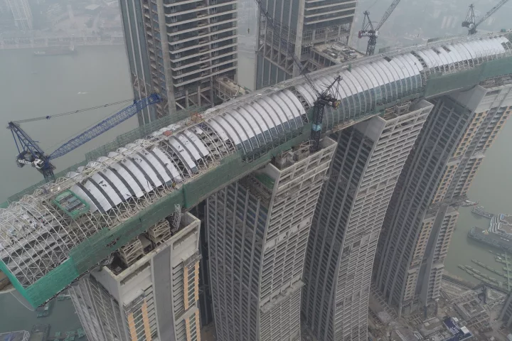 Raffles City Chongqing's horizontal skyscraper, by Moshe Safdie, is officially named the Crystal and measures 300 m (984 ft) in length