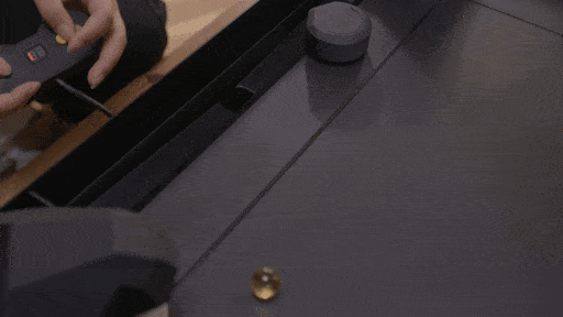 Cannons at each corner of the game board fire marbles into the play area