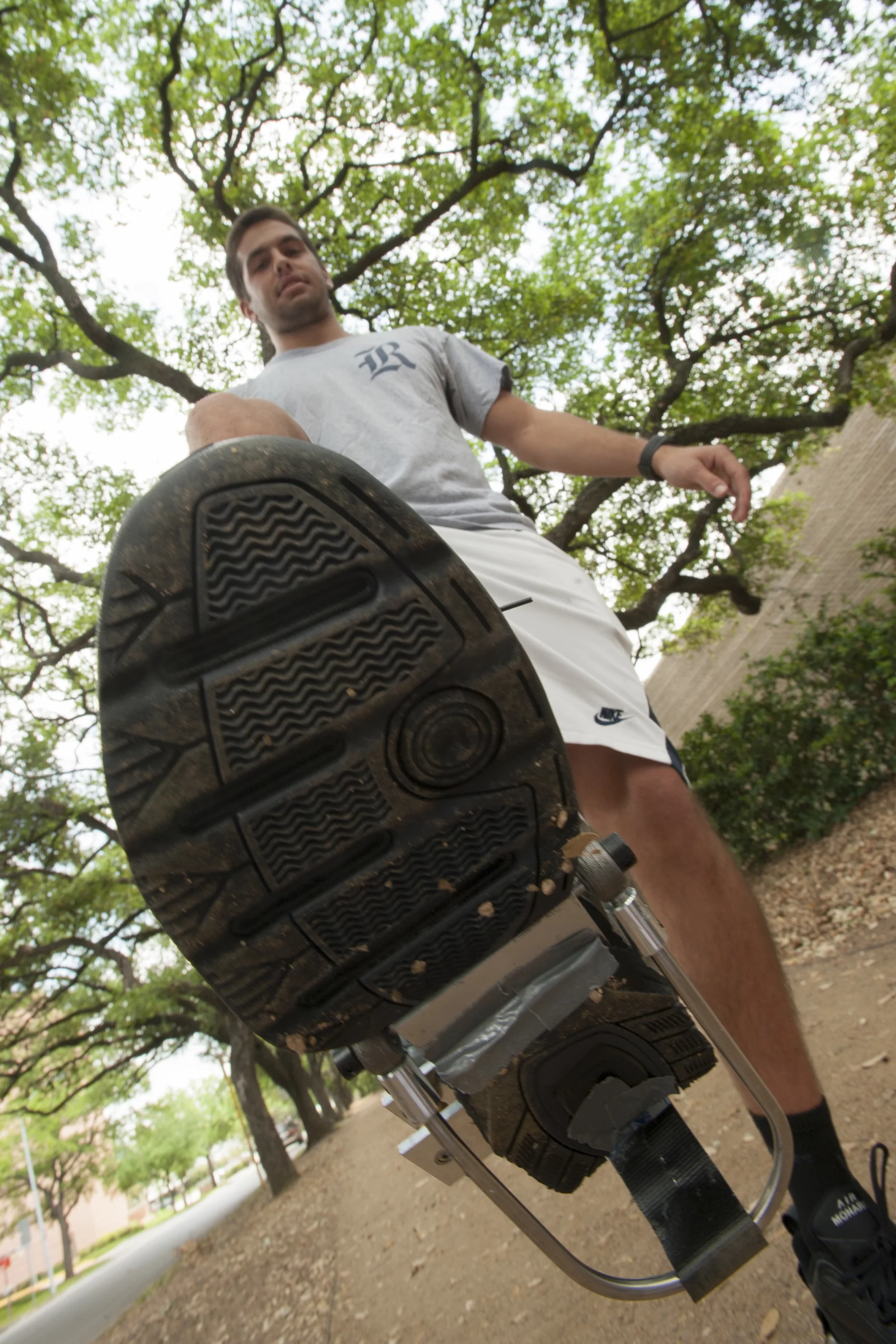 Julian Castro models the PediPower, a kinetic energy-harvesting prototype invented by senior engineering students at Rice University (Photo: Jeff Fitlow)