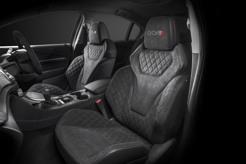 The podium seats in the cabin of the GTS-R W1 are trimmed in quilted Alcantara