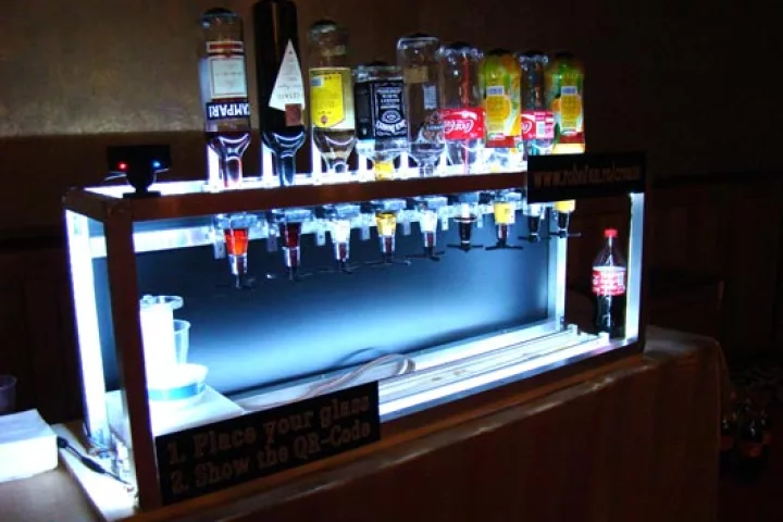 The Social Drink Machine is a robotic bartender that takes your order via Facebook or Twitter apps on your mobile phone
